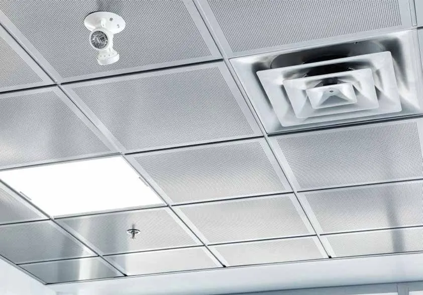 Metal tile ceiling with an air diffuser and light fitting
