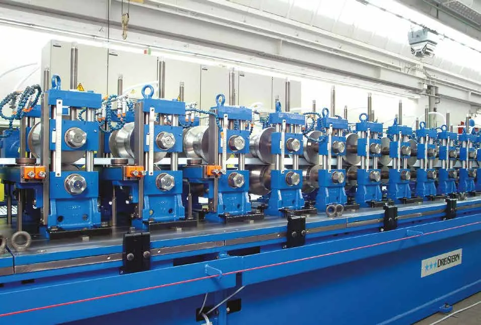 Roll-forming mill with blue roll stands producing steel profiles