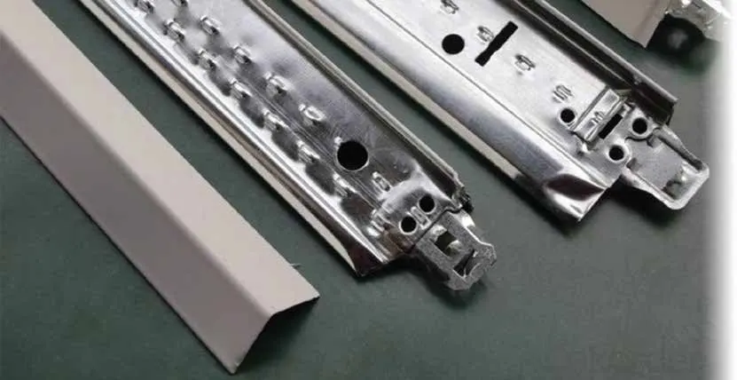 Galvanised ceiling grid tees and a wall angle